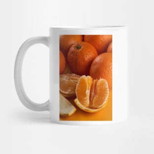 Oranges on a yellow background Mug